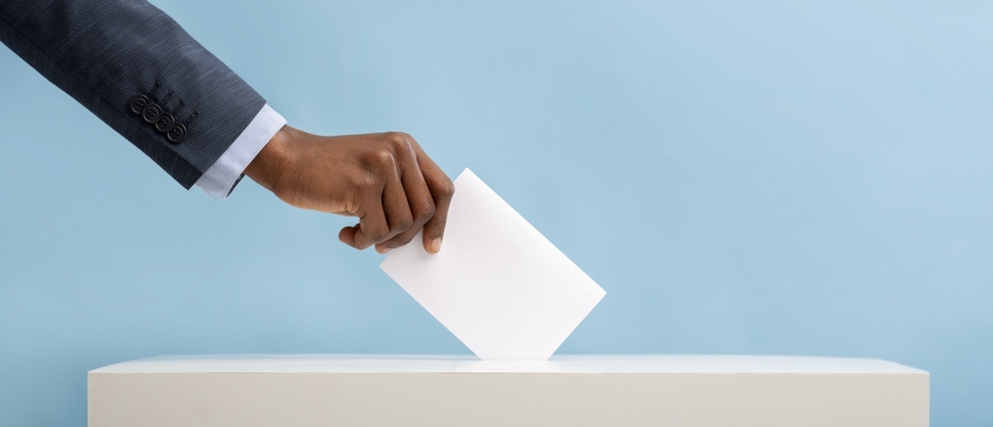 Optimized-african-american-man-voting-for-general-election-i-ZBTG224_(1).jpg
